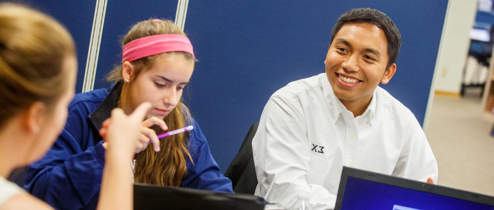 A group of students studying in the library.