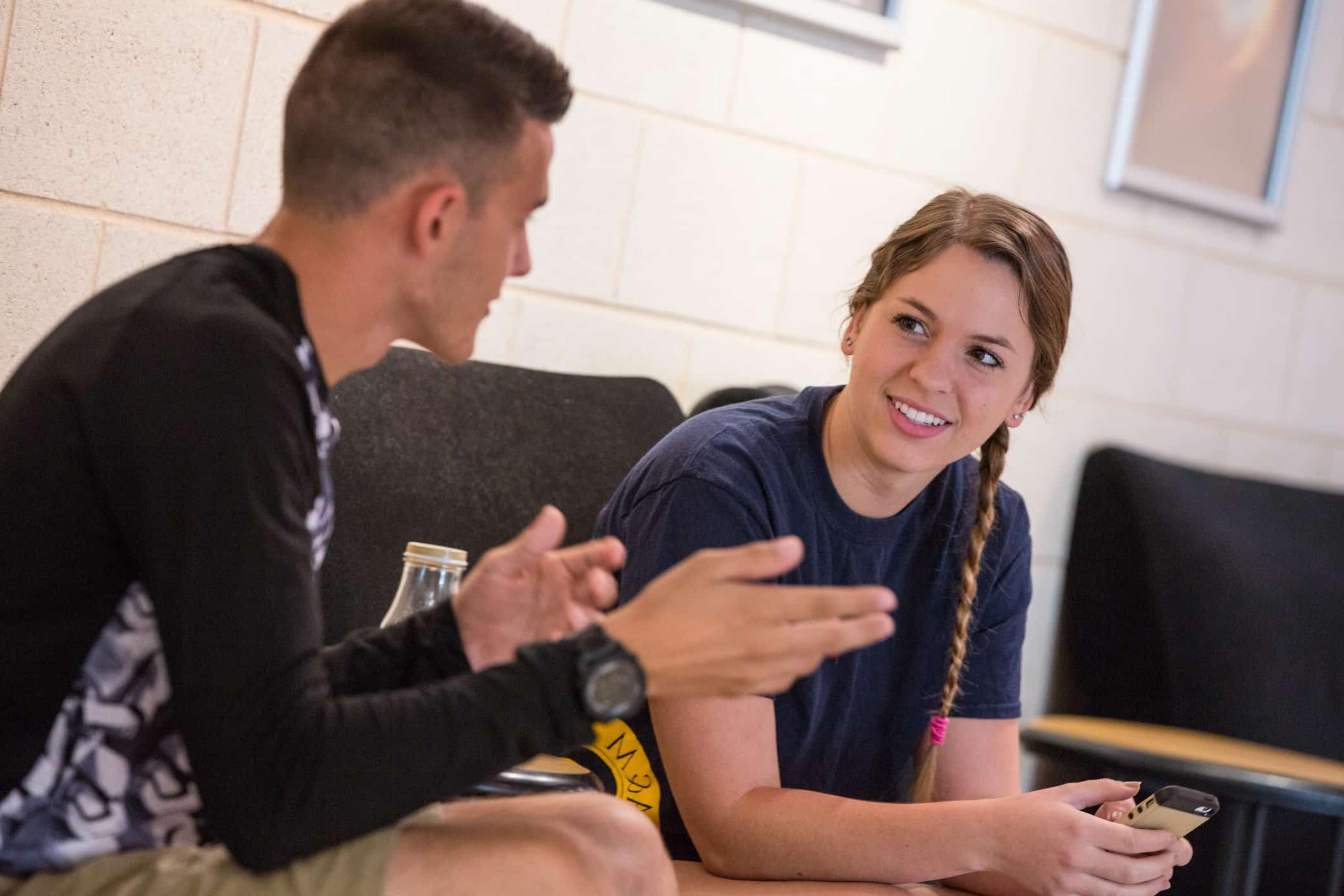 Students talking in science building