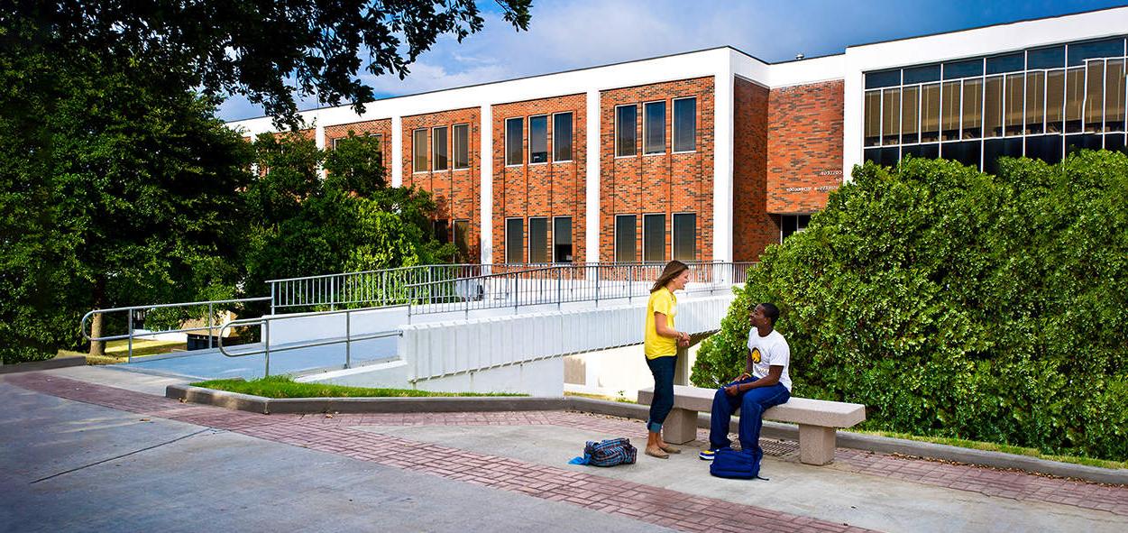 students outside BA building