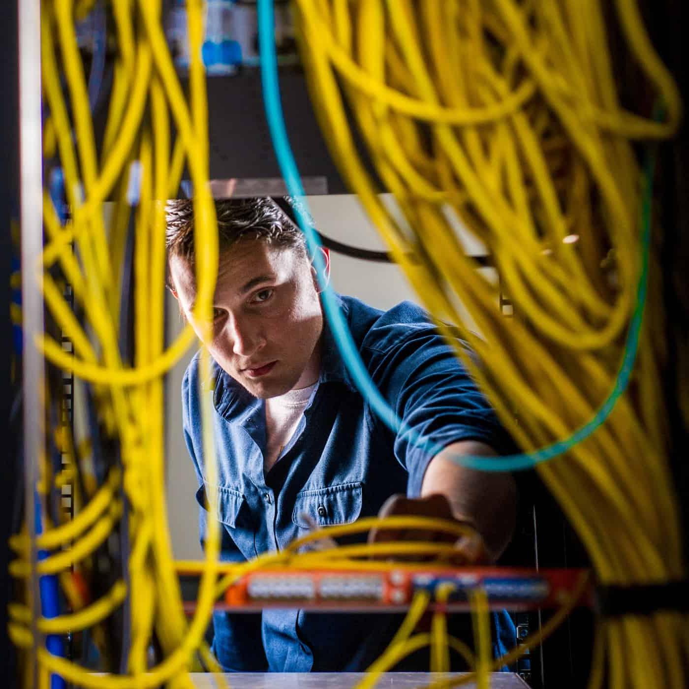 Engineer inspecting electrical gear