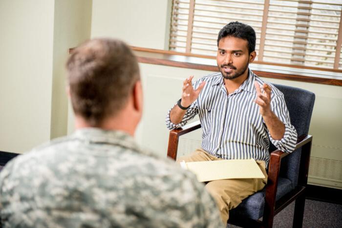 Social worker meeting with a patient.