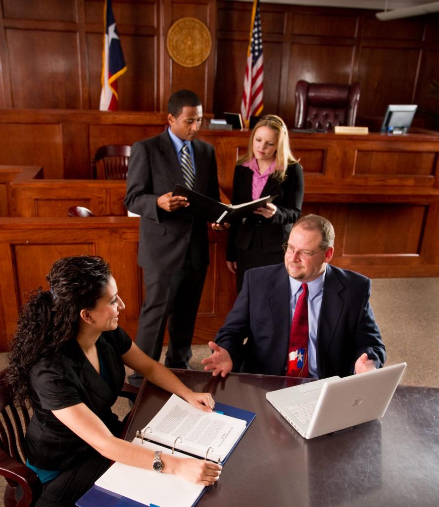 Social workers meeting in a court room.