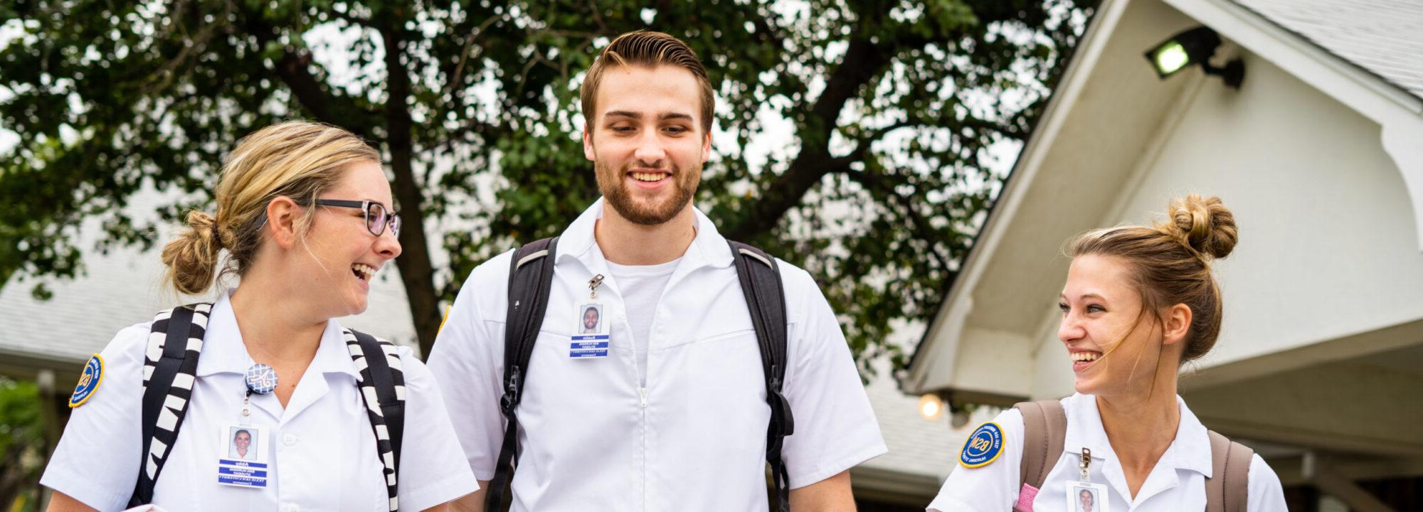 Three nursing students walking together